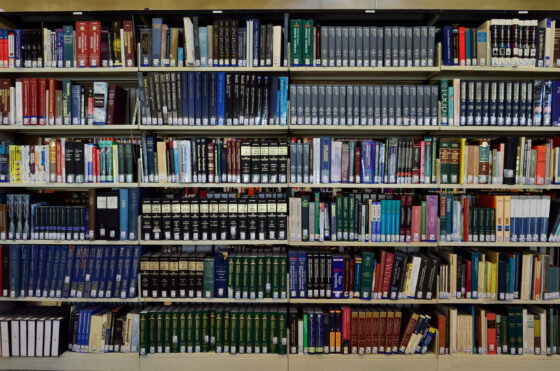 A bookshelf in a library