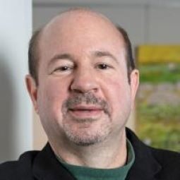 A headshot of Michael Mann, PhD