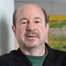 A headshot of Michael Mann, PhD