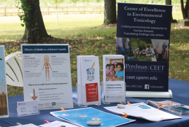 CEET display table with educational materials at community event